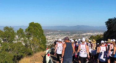 Large group of people walking together in Townsville