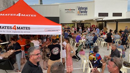 Large group of people at the Mates4Mates Stuart Park centre, celebrating the opening of the centre.